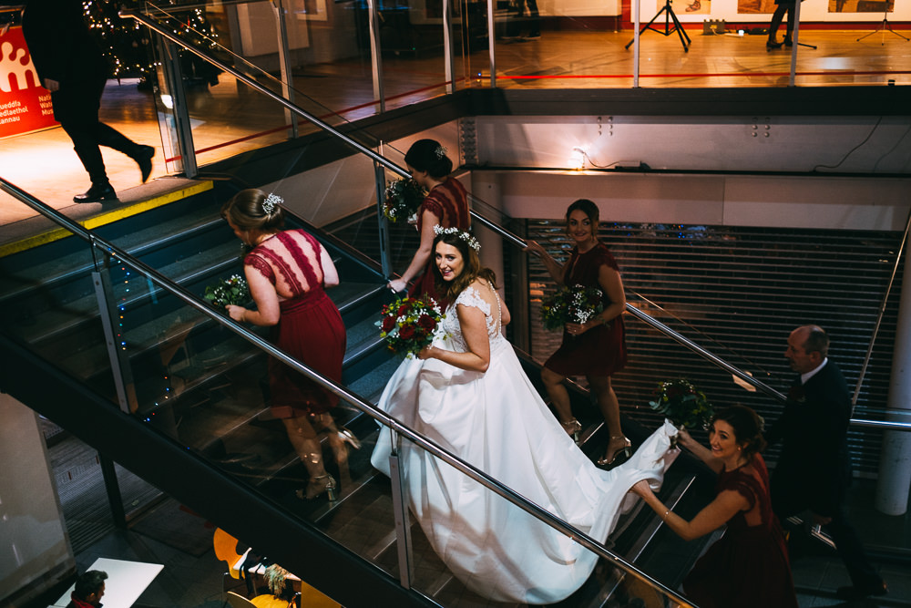 001 BRIDE BRIDESMAIDS MAKING BRIDAL ENTRANCE NATIONAL WATERFRONT MUSEUM WEDDING PHOTOGRAPHY SWANSEA 001 BRIDE BRIDESMAIDS MAKING BRIDAL ENTRANCE NATIONAL WATERFRONT MUSEUM WEDDING PHOTOGRAPHY SWANSEA